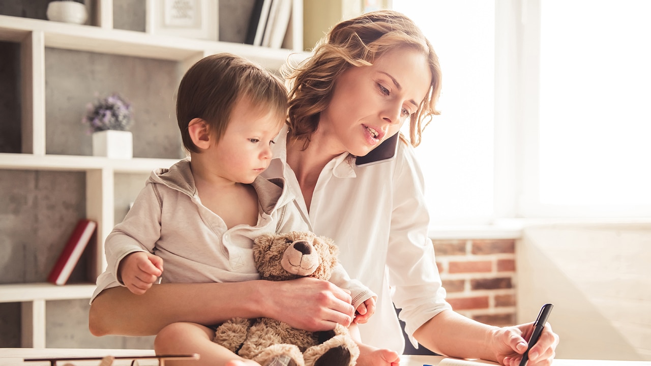 Mom working from home in a virtual business